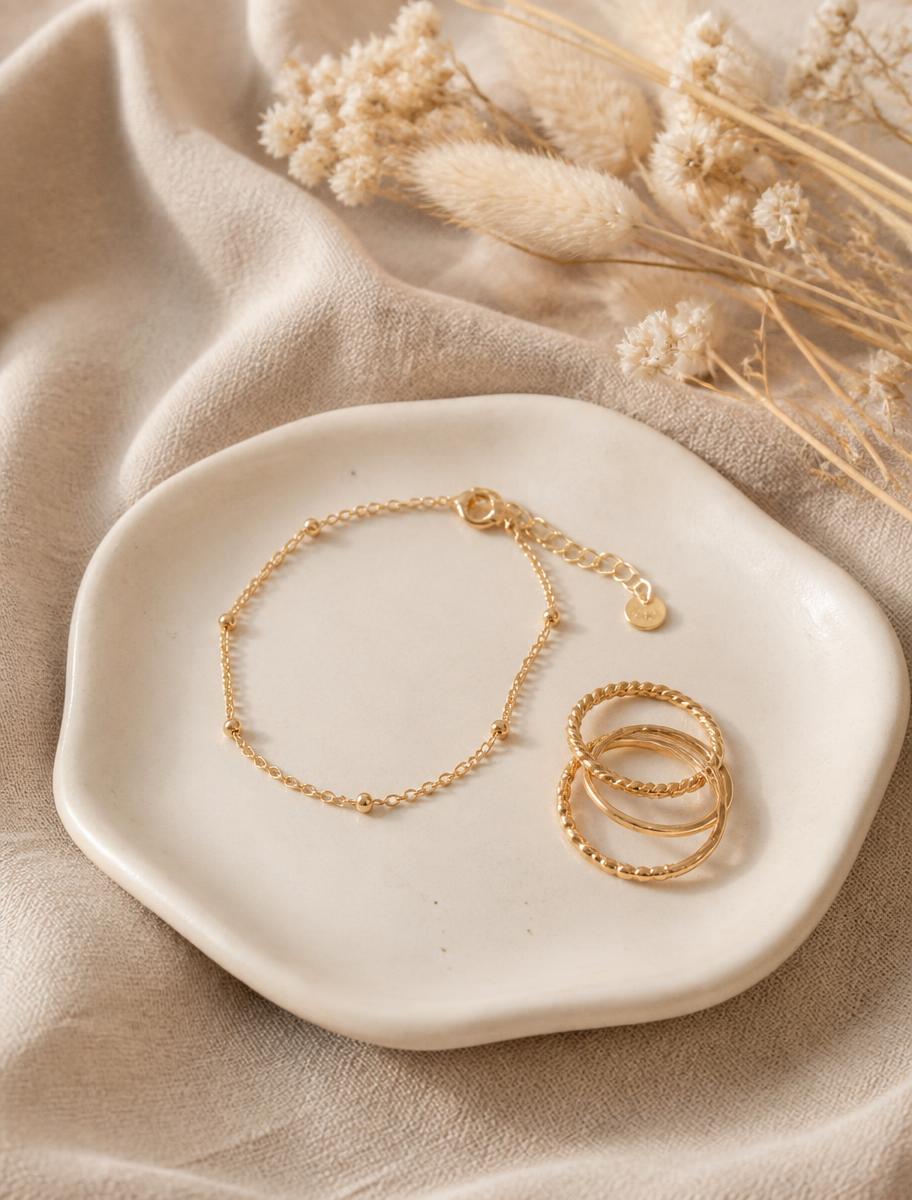 Gold bracelet on dish